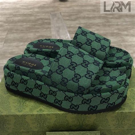 green Gucci slides women's